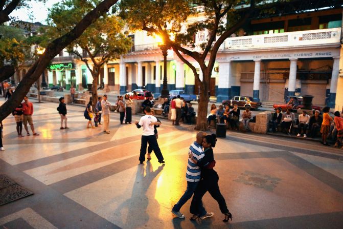 Cubans dance the tango in the middle of the famous Prado boulevard in Habana Vieja.