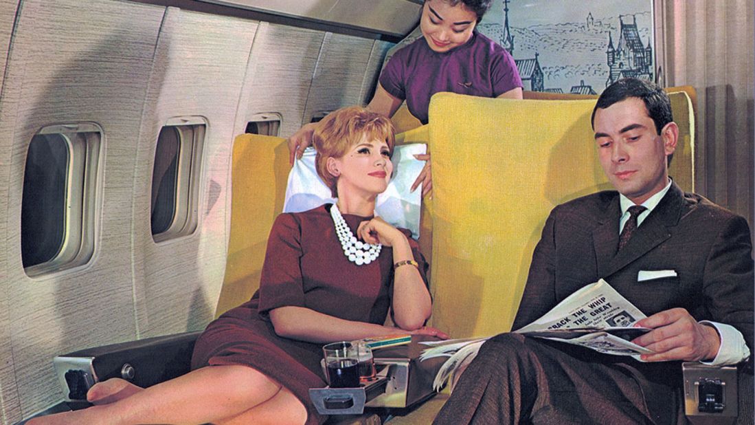 <strong>Never an awkward moment: </strong>Before inflight movies and Wi-Fi, passengers passed the time by reading books or newspapers. Or by caressing their necklaces and gazing off into the middle distance.