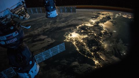 July 25: "#Goodevening #Japan. Showing @Astro_Kimiya how to take pictures of #Earth at night."