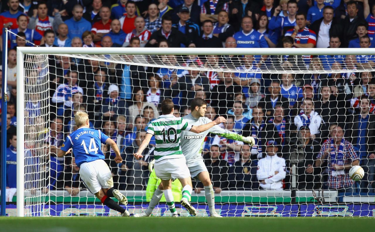  Naismith won three league titles, two League Cups and a Scottish Cup with Rangers --Scottish football's most successful club. Its rivalry with city neighbors Celtic is one of the fiercest in world football. Here, Naismith scores against Celtic in a 4-2 win in 2011.