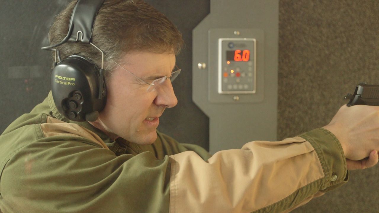A champion rifle shooter as a teen, O'Grady is adept with a pistol, too.