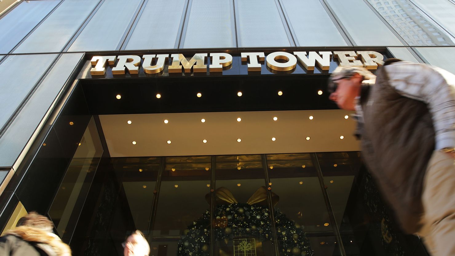 People walk by the Trump Tower in Midtown Manhattan on December 8, 2015 in New York City. Donald Trumps latest incendiary remarks concerning Muslims has led to criticism across the nation, including many of his fellow GOP presidential candidates.