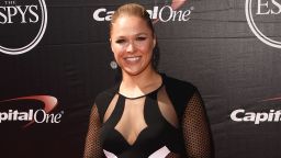 Ronda Rousey made good on a commitment to attend the Marine Corps Ball Friday night with the corporal who invited her in a viral video.