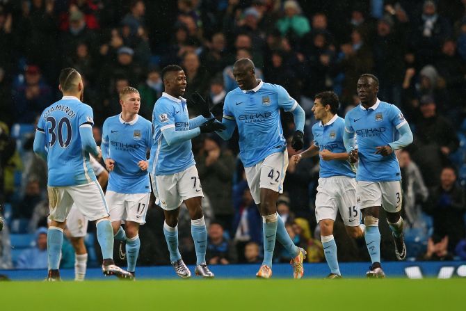 Yaya Toure takes the plaudits after his late shot was deflected home to give Manchester City a 2-1 win over Swansea at the Etihad Stadium.