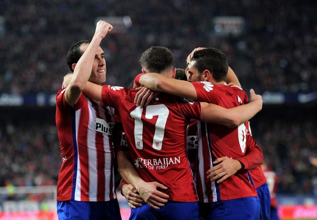 Atletico Madrid drew level on points with Barcelona at the top of La Liga after beating Athletic Bilbao 2-1 with the opening goal from  Saul Niguez.