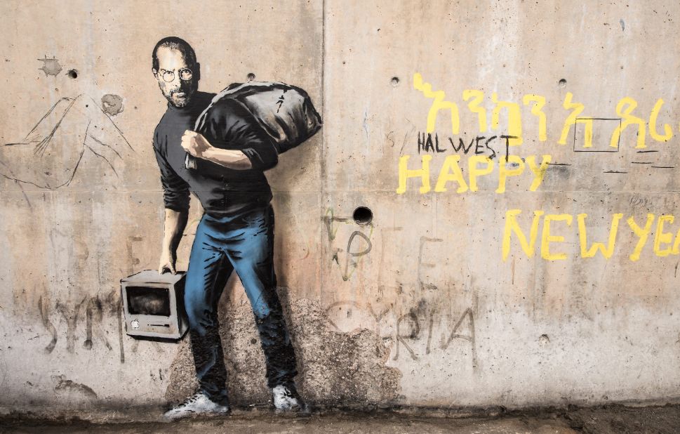 This image one, painted on a concrete bridge in December, depicts the late Steve Jobs, co-founder and CEO of Apple. 