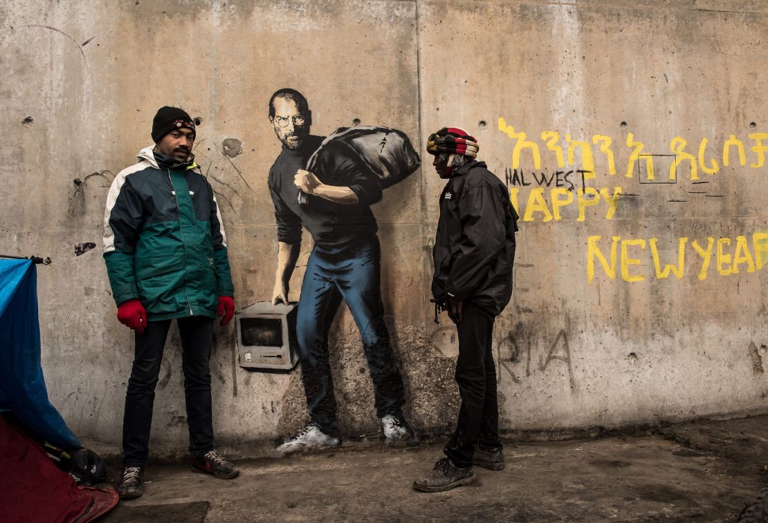 Banky's depiction of Steve Jobs on a wall in Calais, France in 2015
