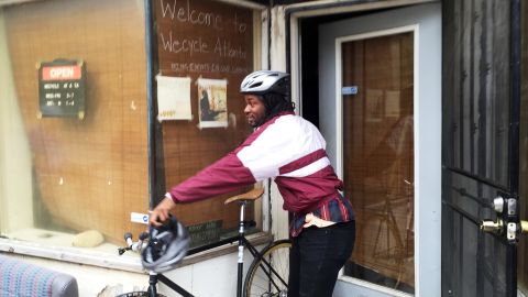Shawn Walton leads kids on neighborhood bike rides