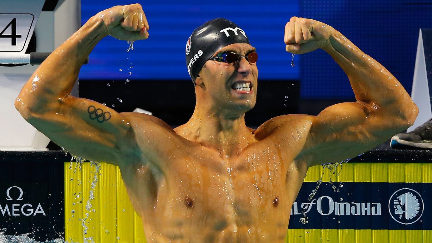 Matt Grevers flexes after he broke the world record in the 100-meter backstroke on Saturday, December 12. The American swimmer finished in 48.92 seconds during the Duel in the Pool event in Indianapolis.