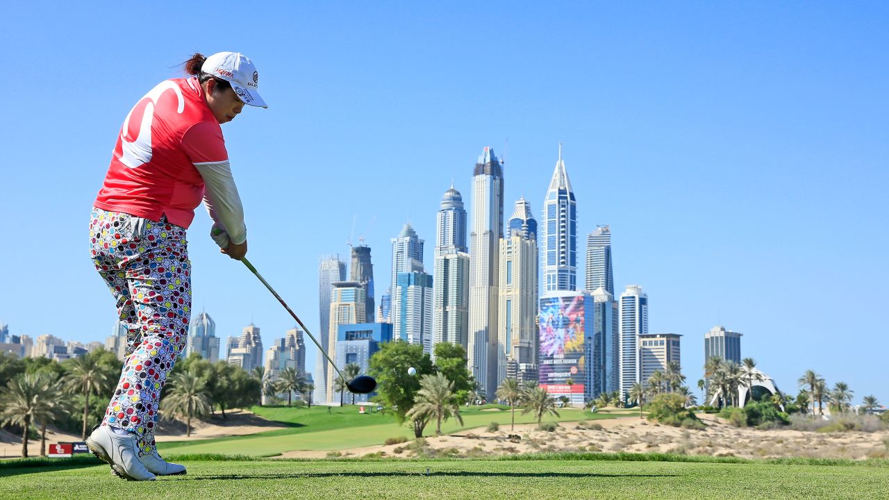 Shanshan Feng hits a tee shot Thursday, December 10, during the second round of the Dubai Ladies Masters, an event on the Ladies European Tour. Feng blew away the field, winning by 12 strokes.