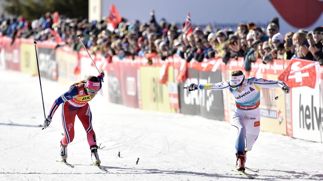 Sweden's Stina Nilsson, right, edges Norway's Maiken Capsersen Falla during a cross-country skiing race in Davos, Switzerland, on Sunday, December 13.