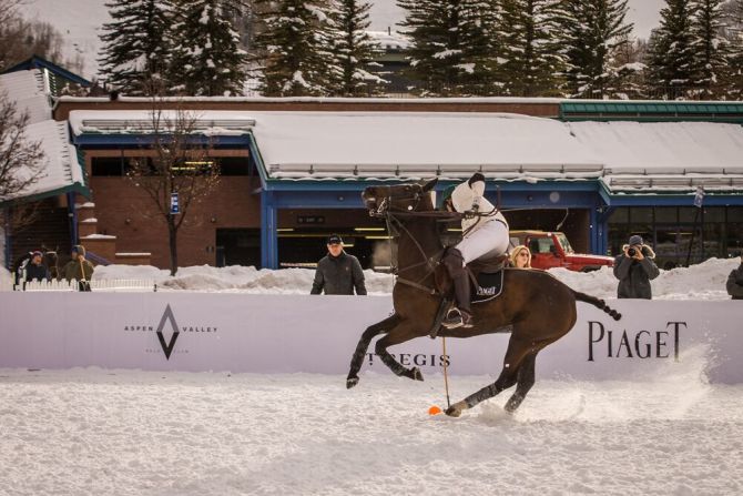 This version of polo is played on a snow-packed field surrounded by fencing to keep the ball in play.