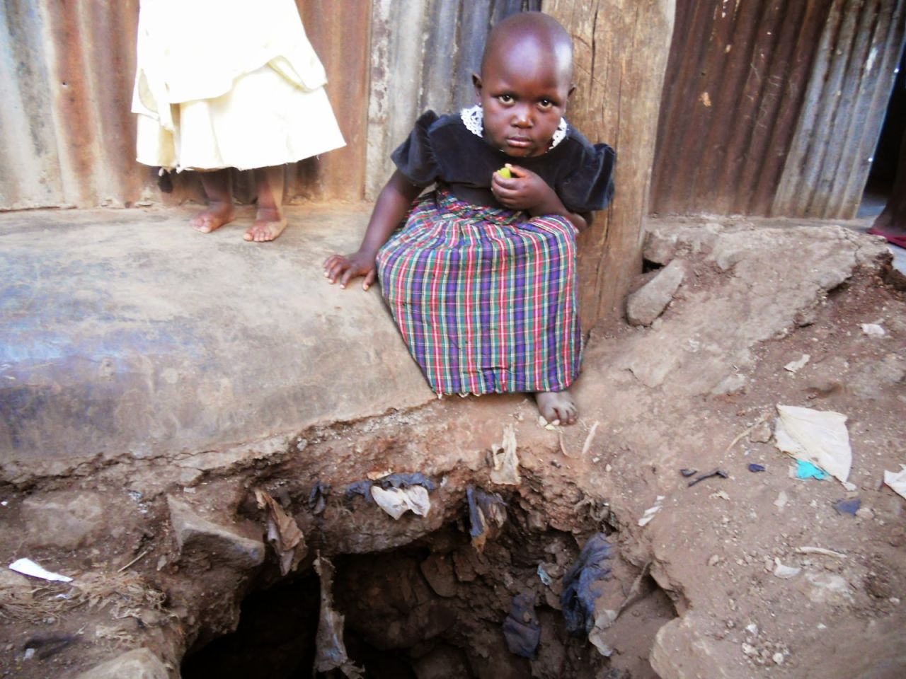 Other images, like this one taken by younger Pamela Anyango, showcase the dangers of the infrastructure issues within Mathare. 