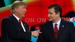 Republican presidential candidates Donald Trump, left, and Sen. Ted Cruz interact at the conclusion of the CNN Republican presidential debate at The Venetian Las Vegas on December 15, 2015.