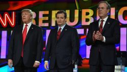 Republican presidential candidates Donald Trump, Sen. Ted Cruz and Jeb Bush stand on stage during the CNN presidential debate at The Venetian Las Vegas on December 15, 2015.