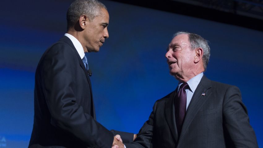 US President Barack Obama shakes hands with former New York City Mayor Michael Bloomberg during the US - Africa Business Forum on the sidelines of the US - Africa Leaders Summit in Washington, DC, August 5, 2014.