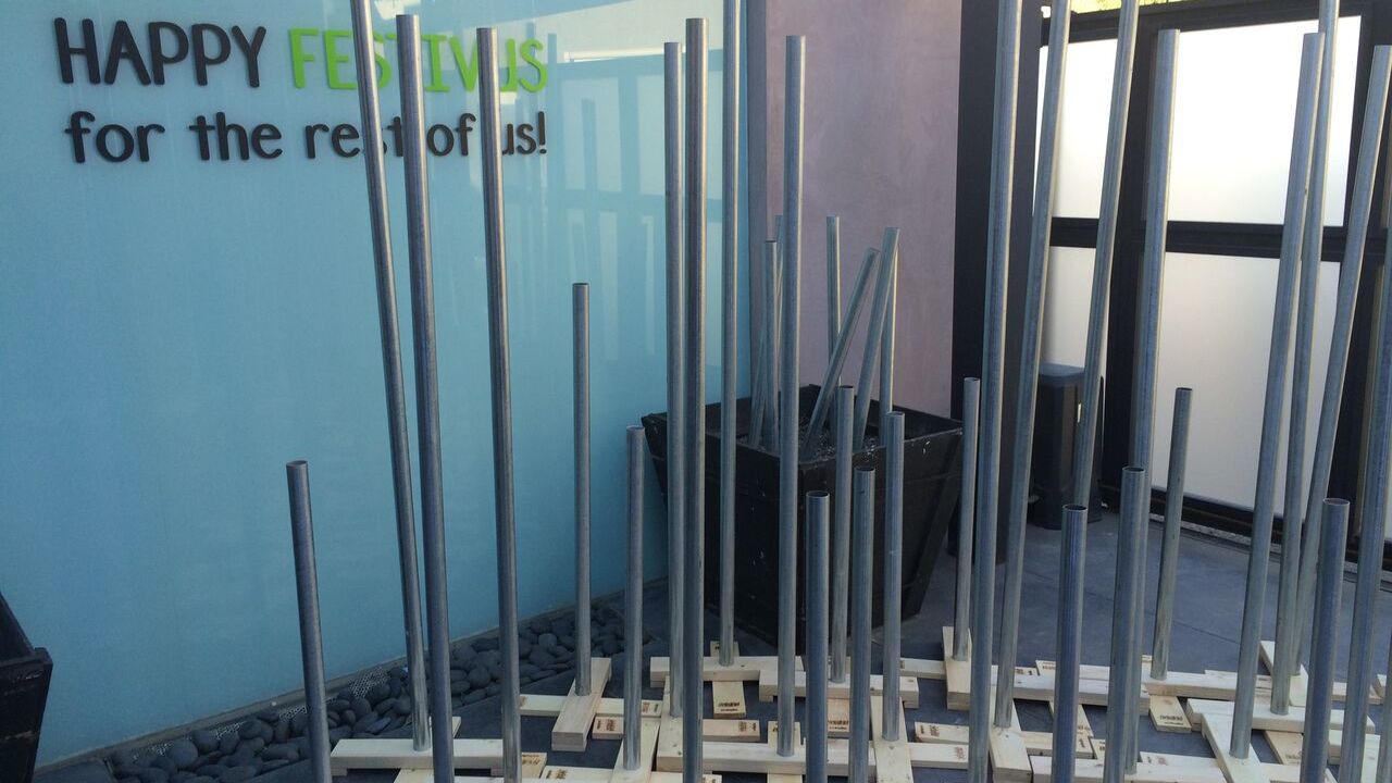 The "Seinfeld: The Apartment" experience in West Hollywood includes a Festivus pole garden.