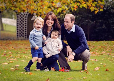 The family poses for a Christmas photo in December 2015.