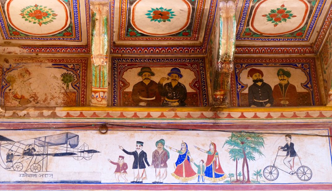 A more elegant way to show off your travel memories than Facebook? This mural shows a family seeing off a plane, showing the advent of East-meets-West influence in Mandawa.