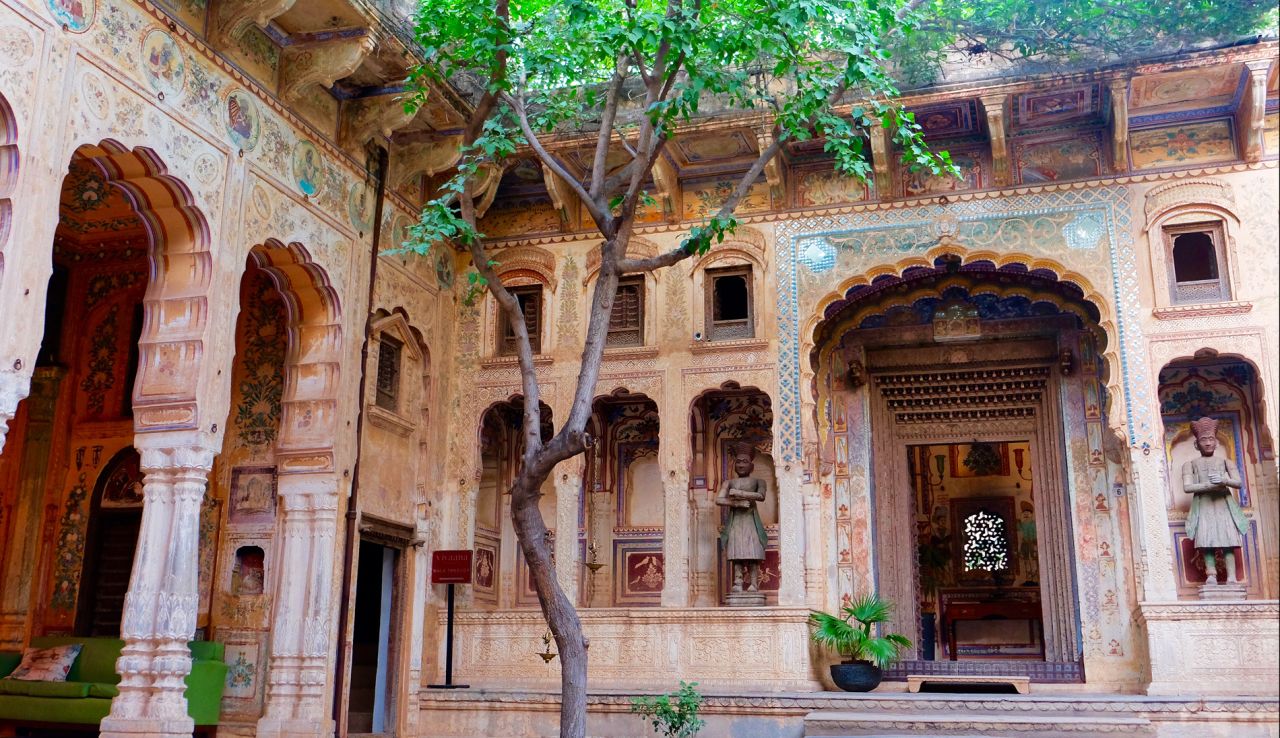 The outer courtyard and grand entrance of Vivaana Culture Hotel, restored by Atul Khanna. A haveli is usually organized around two courtyards. The outer is strictly reserved for meetings and trade with visitors while the inner is occupied by an extended family.