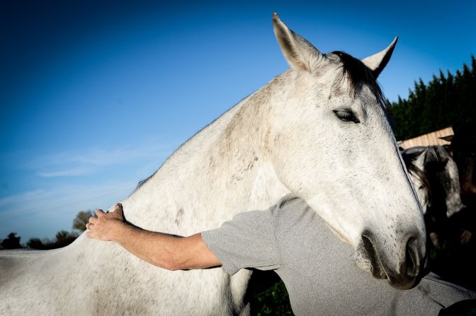 "Calling a horse in from a field is hard enough, but he can just turn up, move his hand and they will all come running to him," Peck explains.