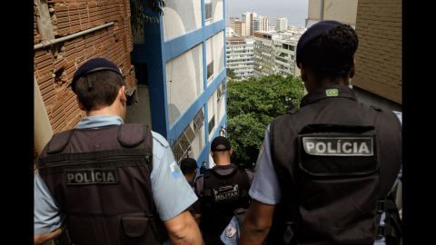 A Police Pacification Unit monitors the Cantagalo favela. Launched in 2008, the "pacification" program has been put in place in nearly 40 favelas and has received mixed reviews. It was designed to limit the reach of armed drug gangs by installing permanent police posts within the favelas where they typically operated. 