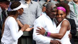 LONDON, ENGLAND - JULY 07:  Serena Williams (R) of the USA celebrates with her father Richard Williams and sister Venus Williams after her Ladies? Singles final match against Agnieszka Radwanska of Poland on day twelve of the Wimbledon Lawn Tennis Championships at the All England Lawn Tennis and Croquet Club on July 7, 2012 in London, England.  (Photo by Julian Finney/Getty Images)