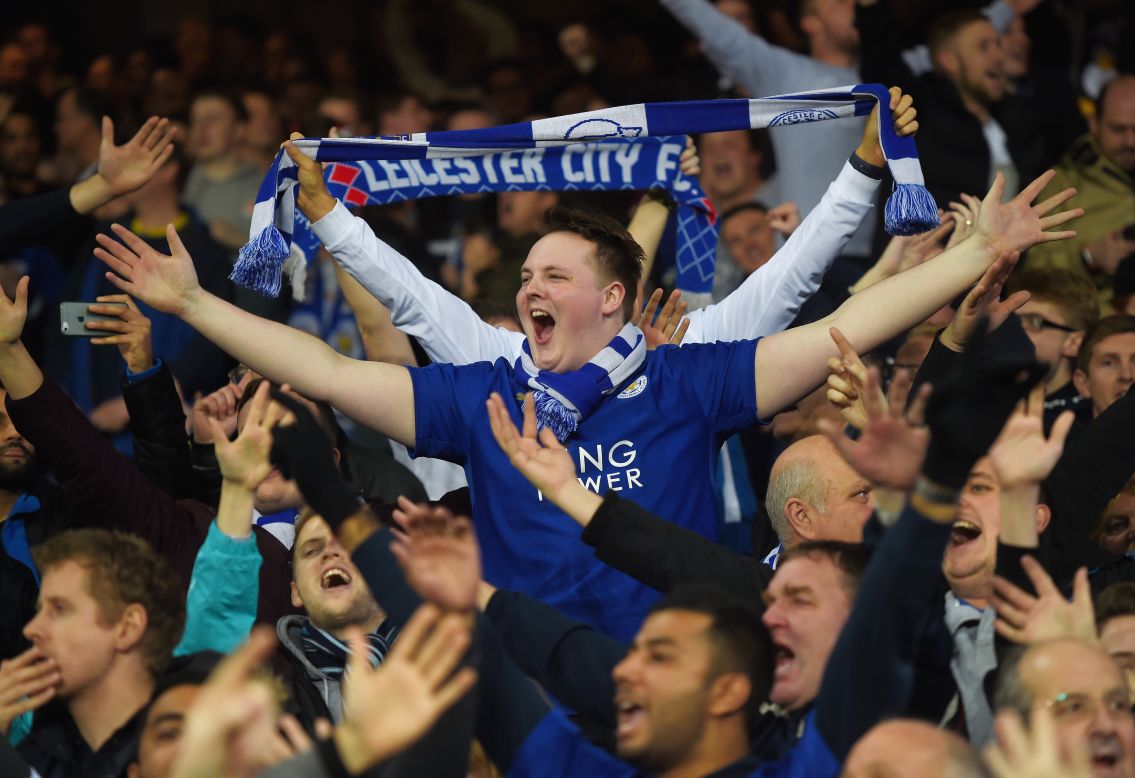 Leicester City supporters celebrate their team's 3-2 win against Everton at Goodison Park.