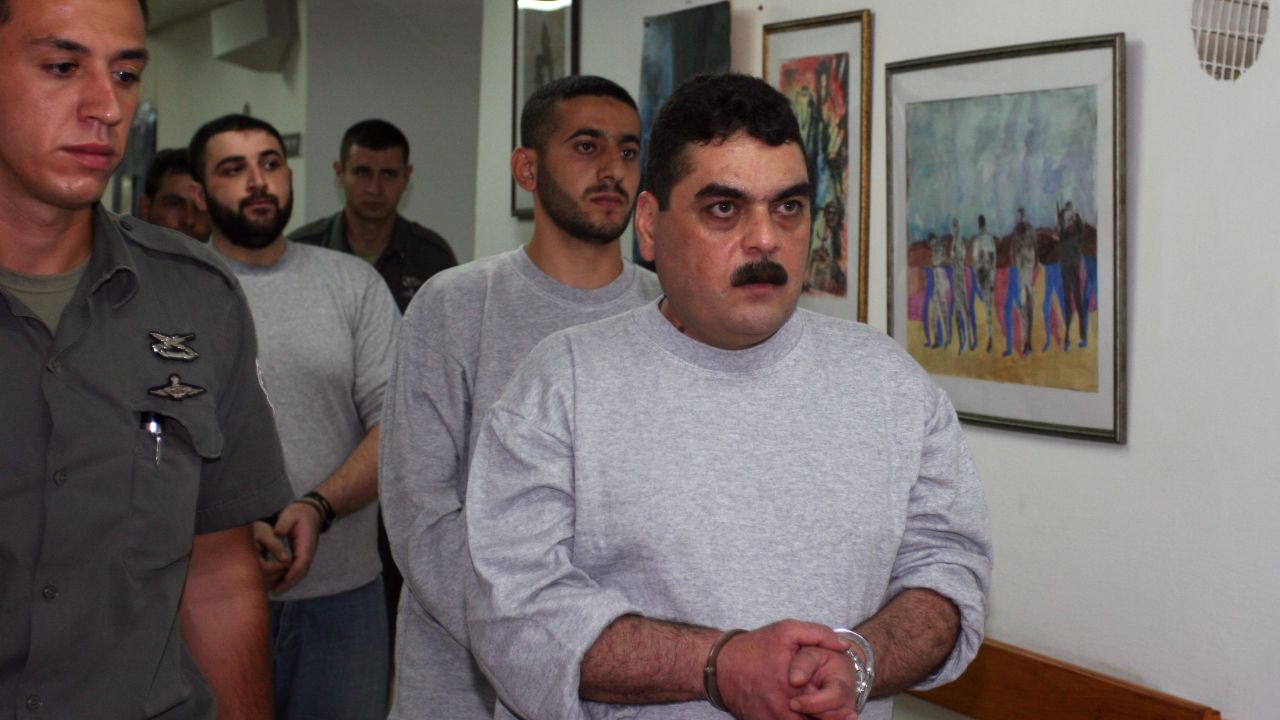 Samir Kuntar is taken to be processed for release on July 16, 2008, at the Hadarim Prison in central Israel.