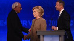 US Democratic presidential hopefuls (L-R) Bernie Sanders, Hillary Clinton and Martin O'Malley greet each other following the Democratic Presidential Debate hosted by ABC News at Saint Anselm College in Manchester, New Hampshire, on December 19, 2015.