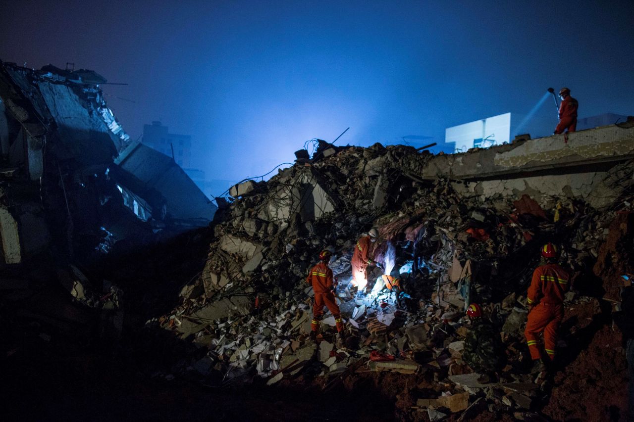 The search through the piles of rubble was made more difficult as light faded.