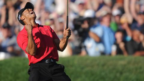 Tiger Woods celebrates his birdie putt on the 18th hole at the US Open on June 15, 2008.