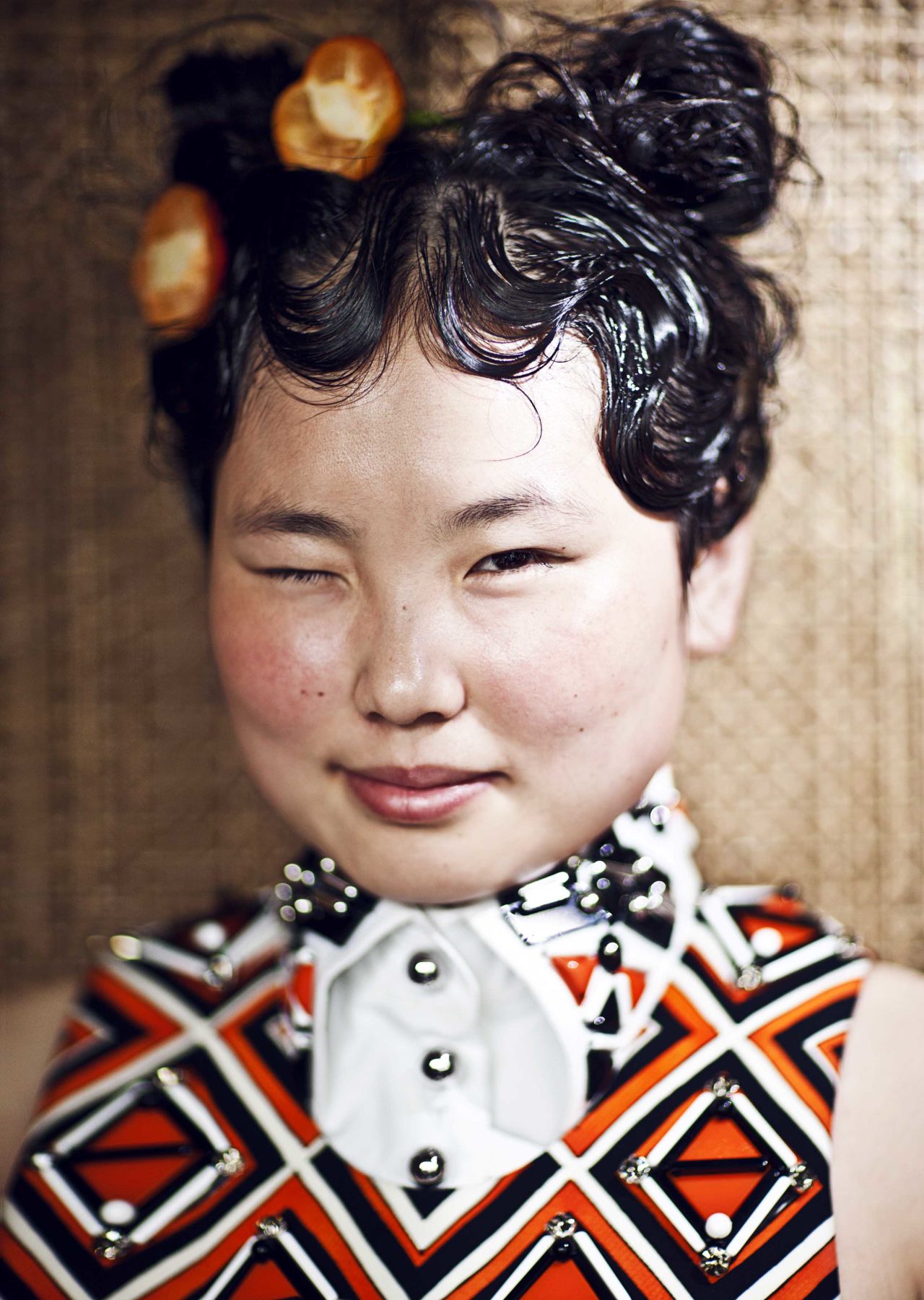 This portrait of a waitress at a vegetarian restaurant, was shot in 2012 for i.D. The series depicted China's ethnic minorities.