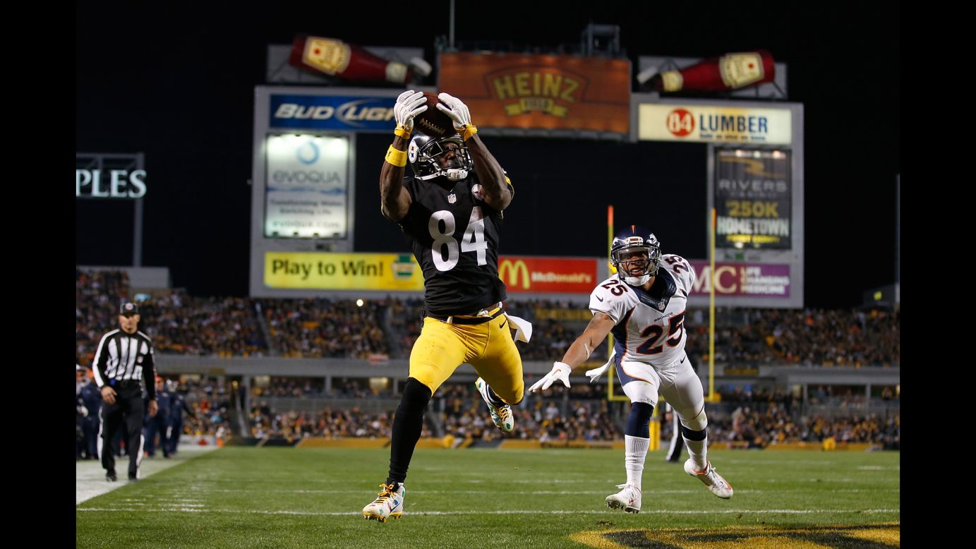Antonio Brown of the Pittsburgh Steelers catches a touchdown pass in the third quarter against the Denver Broncos at Heinz Field in Pittsburgh on Sunday, December 20.