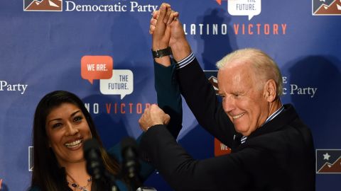 Democratic candidate for lieutenant governor and current Nevada Assemblywoman Lucy Flores (D-Las Vegas) (L) introduces U.S. Vice President Joe Biden at a get-out-the-vote rally at a union hall on November 1, 2014 in Las Vegas, Nevada.