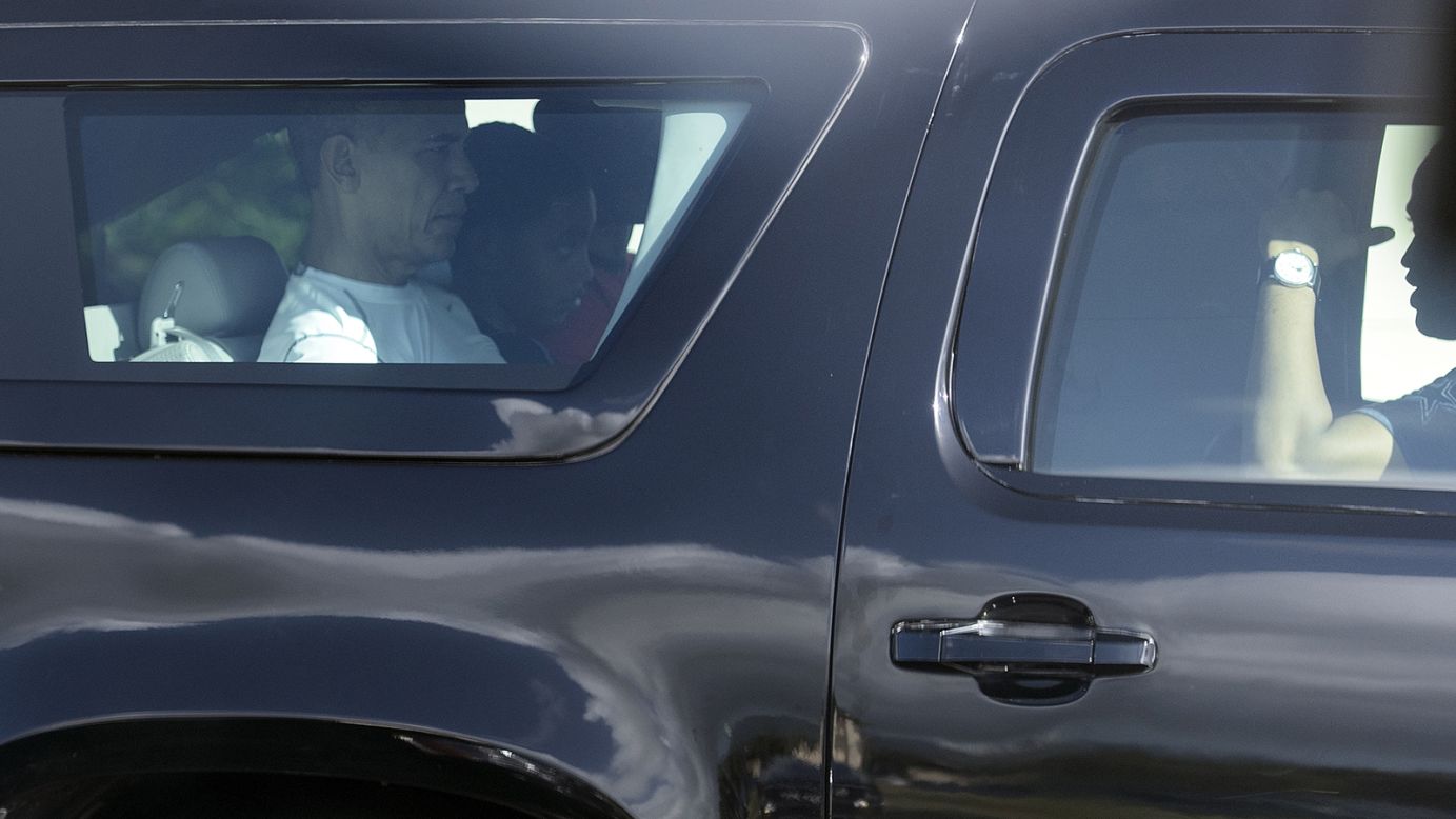 Obama leaves U.S. Marine Corps Base Hawaii in an armored vehicle on Monday, December 21, on the island of Oahu.
