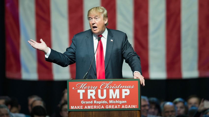 Republican presidential candidate Donald Trump speaks to guests at a campaign event on December 21, 2015 in Grand Rapids, Michigan. The full-house event was repeatedly interrupted by protestors. 