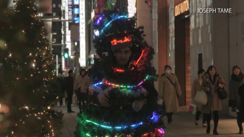 japan christmas tree man streets
