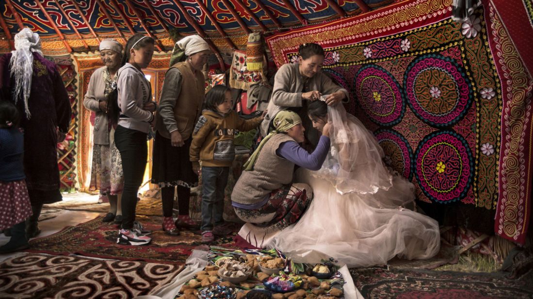 Another Brit, Tim Allen, earned a "faces, people, encounters" runner-up prize for this image of Kazakh wedding season in Western Mongolia's Altai Mountains, Western Mongolia.(Photo Tim Allen/www.tpoty.com)