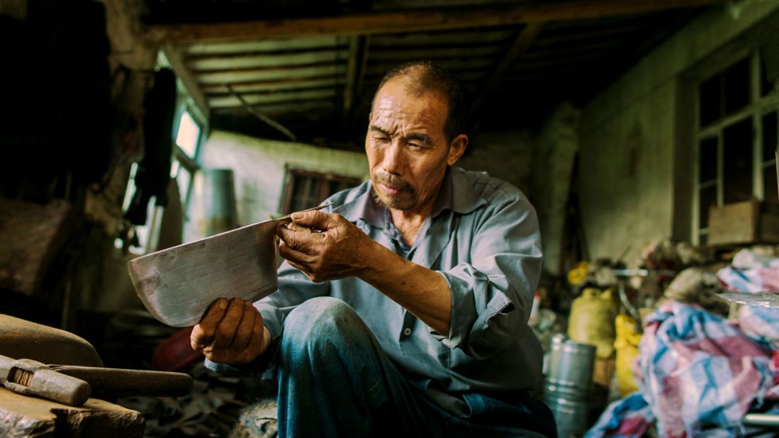 Chinese photographer Zhu Jingyi scooped the competition's "new talent" prize for a series of images depicting street culture of Jiangsu, the province to the north of Shanghai. Among his subjects is this blacksmith. (Photo: Zhu Jingyi/www.tpoty.com) 