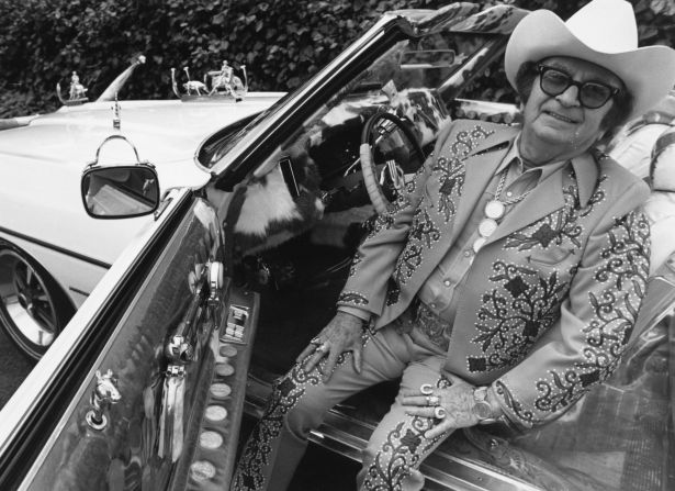 The tailor's flamboyant style had a lasting impact on American country and western clothing. Decades after his death, granddaughter Jamie Nudie has reopened Nudie's Rodeo Tailors in California. <br />