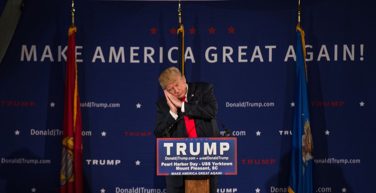 Trump pretends to sleep December 7 as he references fellow candidate Jeb Bush at a Pearl Harbor Day Rally in Mount Pleasant, South Carolina. It was here that Trump read a press release calling for a "complete and total shutdown of Muslims entering the United States" in light of the San Bernardino terror attacks.