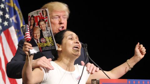 Trump invites Colombian-born super fan Myriam Witcher on the stage during a campaign rally in Las Vegas on October 8. "I am Hispanic and I vote for Mr. Trump. We vote for Mr. Trump!" Witcher exclaimed.