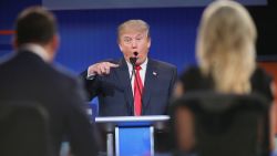 Trump fields a question during the first Republican presidential debate hosted by Fox News and Facebook at the Quicken Loans Arena on August 6, 2015 in Cleveland, Ohio. The top ten GOP candidates were selected to participate in the debate based on their rank in an average of the five most recent political polls.