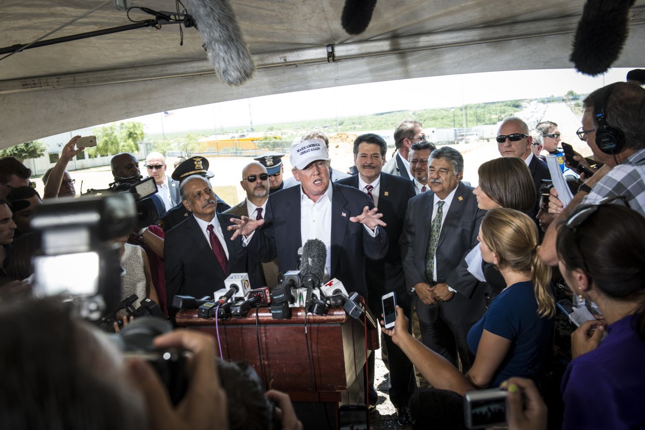 Trump talks to the media along the U.S.-Mexico border during a trip to Laredo, Texas, on July 23. This is where <a href="http://www.cnn.com/2015/07/23/politics/donald-trump-hat-border-tour-laredo/">Trump first premiered</a> his "Make America Great Again" hat. 