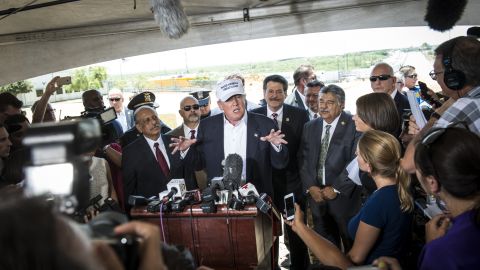 Trump talks to the media along the U.S.-Mexico border during a trip to Laredo, Texas, on July 23. This is where <a href="http://www.cnn.com/2015/07/23/politics/donald-trump-hat-border-tour-laredo/">Trump first premiered</a> his "Make America Great Again" hat.