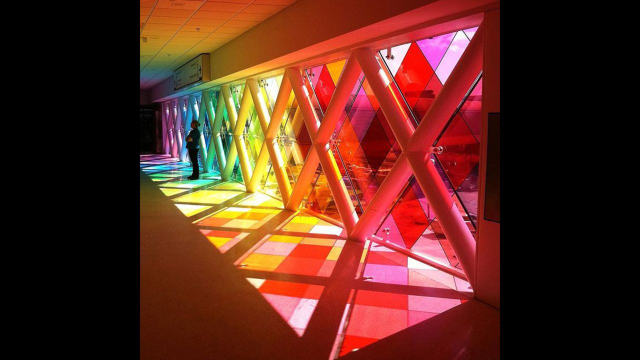 Artist Christopher Janney created this installation at Miami International. It changes colors and passersby hear sounds Janney recorded from his trips to the Florida Everglades. Photo: Robin Hill/Courtesy Christopher Janney. See more <a href="http://cnn.it/1MBTtDI" target="_blank" target="_blank">airport art here</a>.
