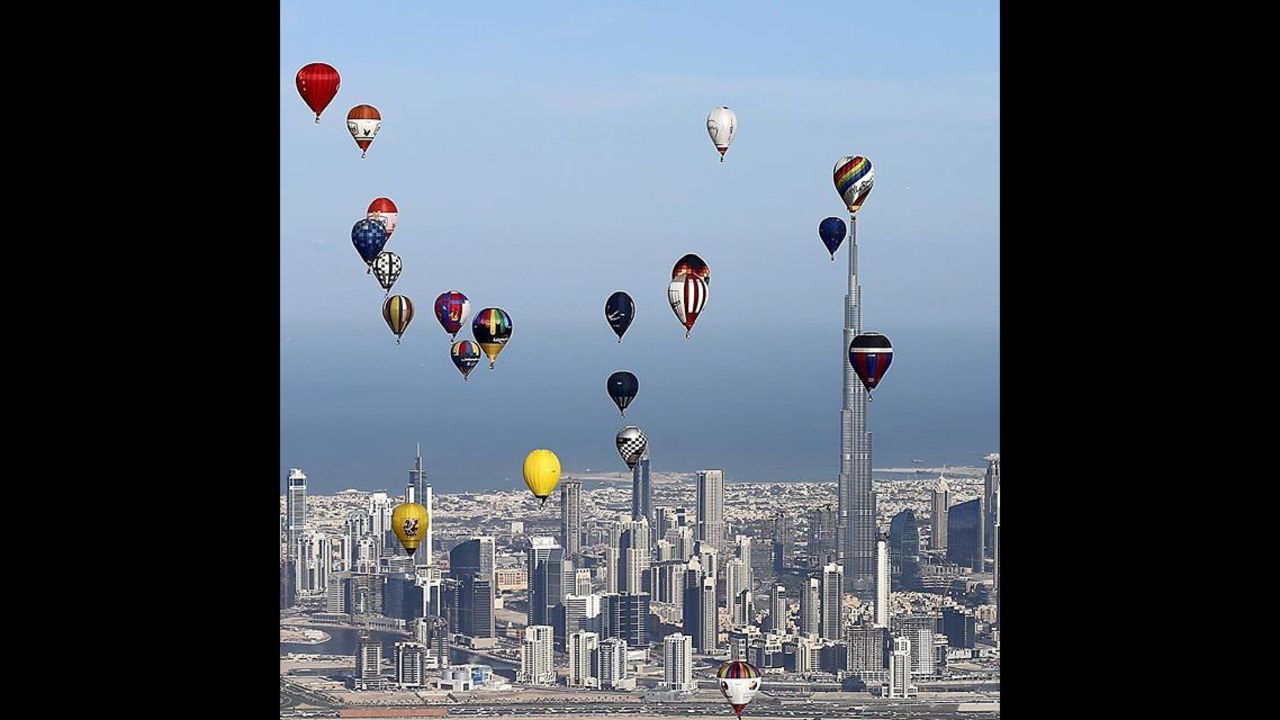 Hot air balloons flew over Dubai during the World Air Games 2015 on December 9. KARIM SAHIB/AFP/Getty Images