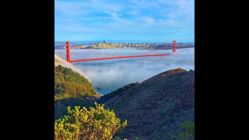 CNN's Khalil Abdallah (@<a href="https://www.instagram.com/daftpix/" target="_blank" target="_blank">madcameraman</a>) took this  shot of low-lying stratus clouds rolling through the Golden Gate Bridge.