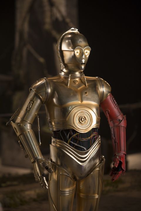 <strong>C-3PO</strong> (Anthony Daniels), back for his seventh installment in the saga, this time featuring a new red limb. He's the only actor to have had a speaking part in all of the films and ties his number of appearances with Kenny Baker (as R2-D2).